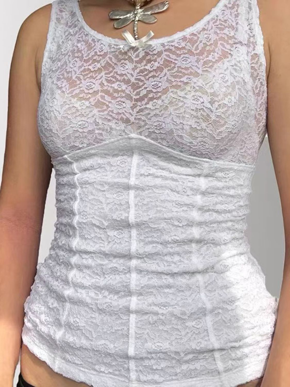 Lace round neck tank, semi-sheer and highly stretchy.