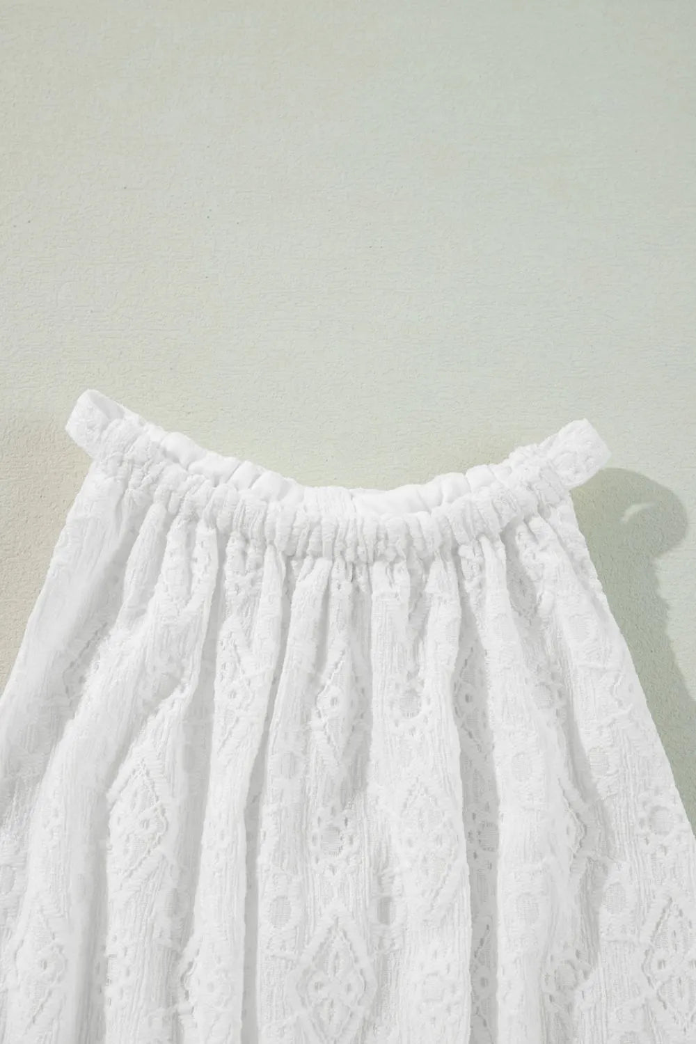 Lace Sleeveless Tied Waist Mini Dress.