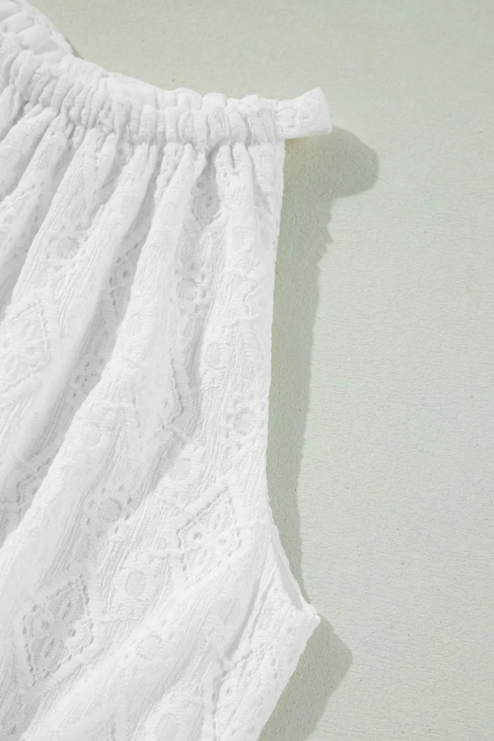 Lace Sleeveless Tied Waist Mini Dress.