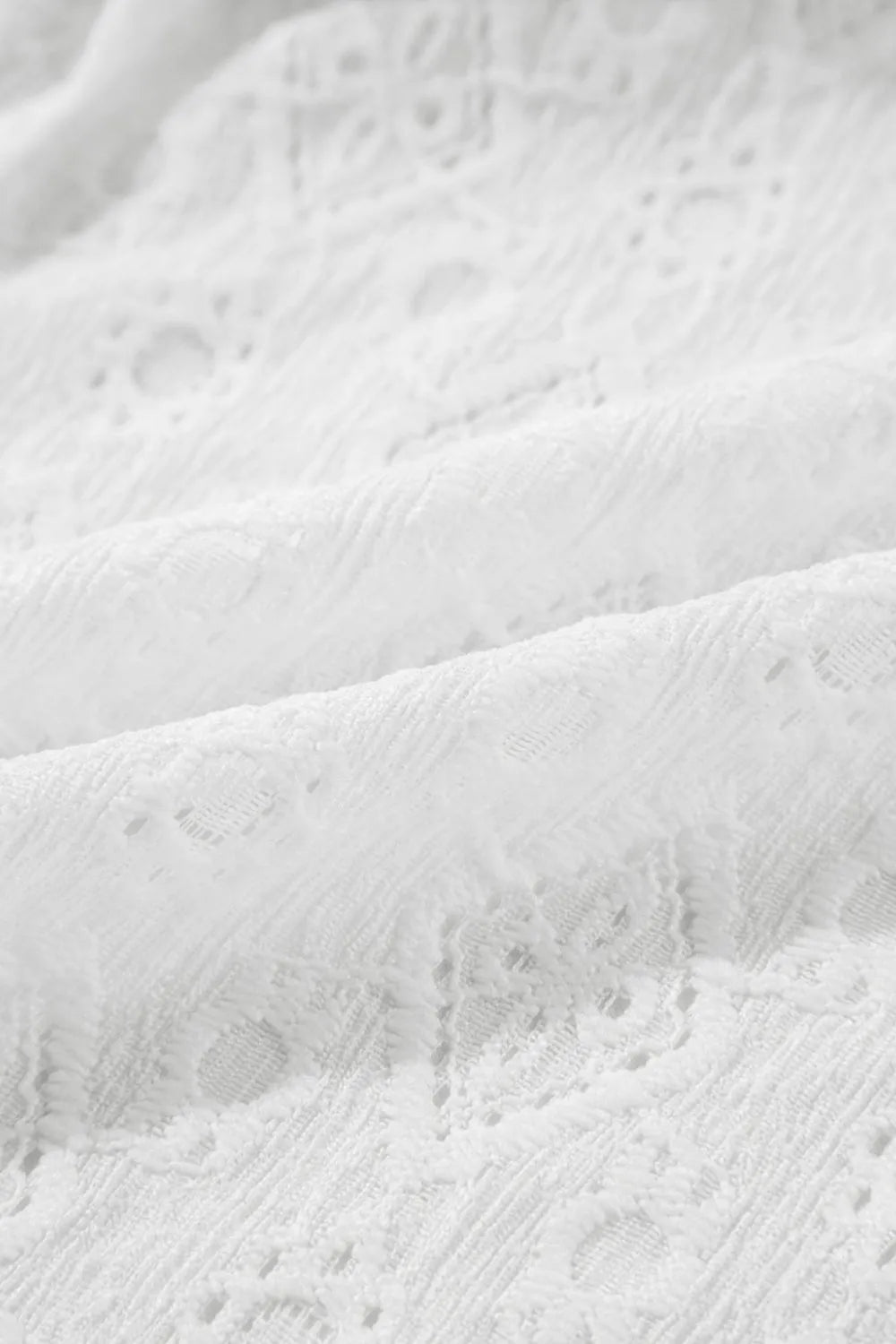 Lace Sleeveless Tied Waist Mini Dress.