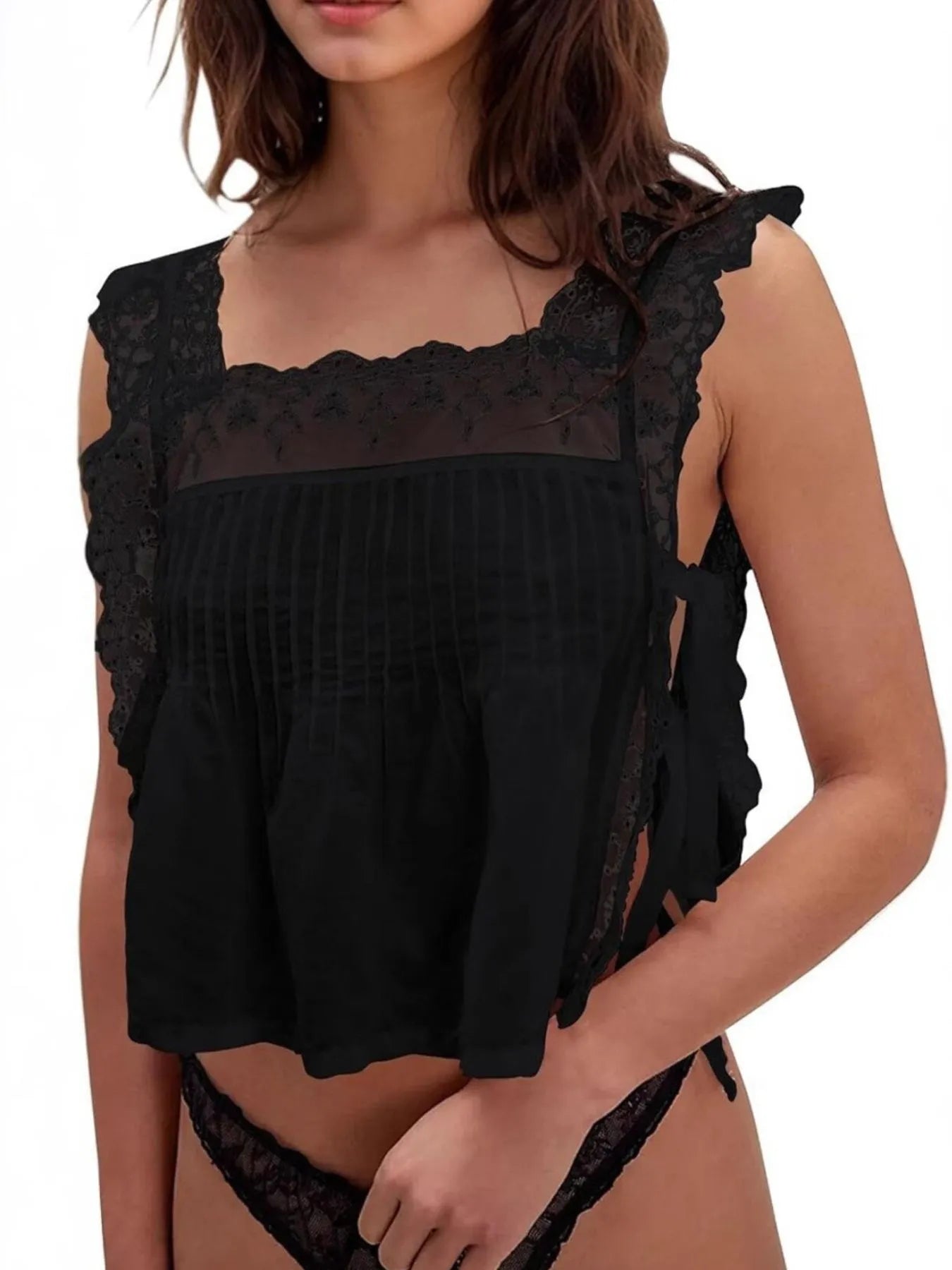 Lace-trimmed eyelet square neck top with tie detail.