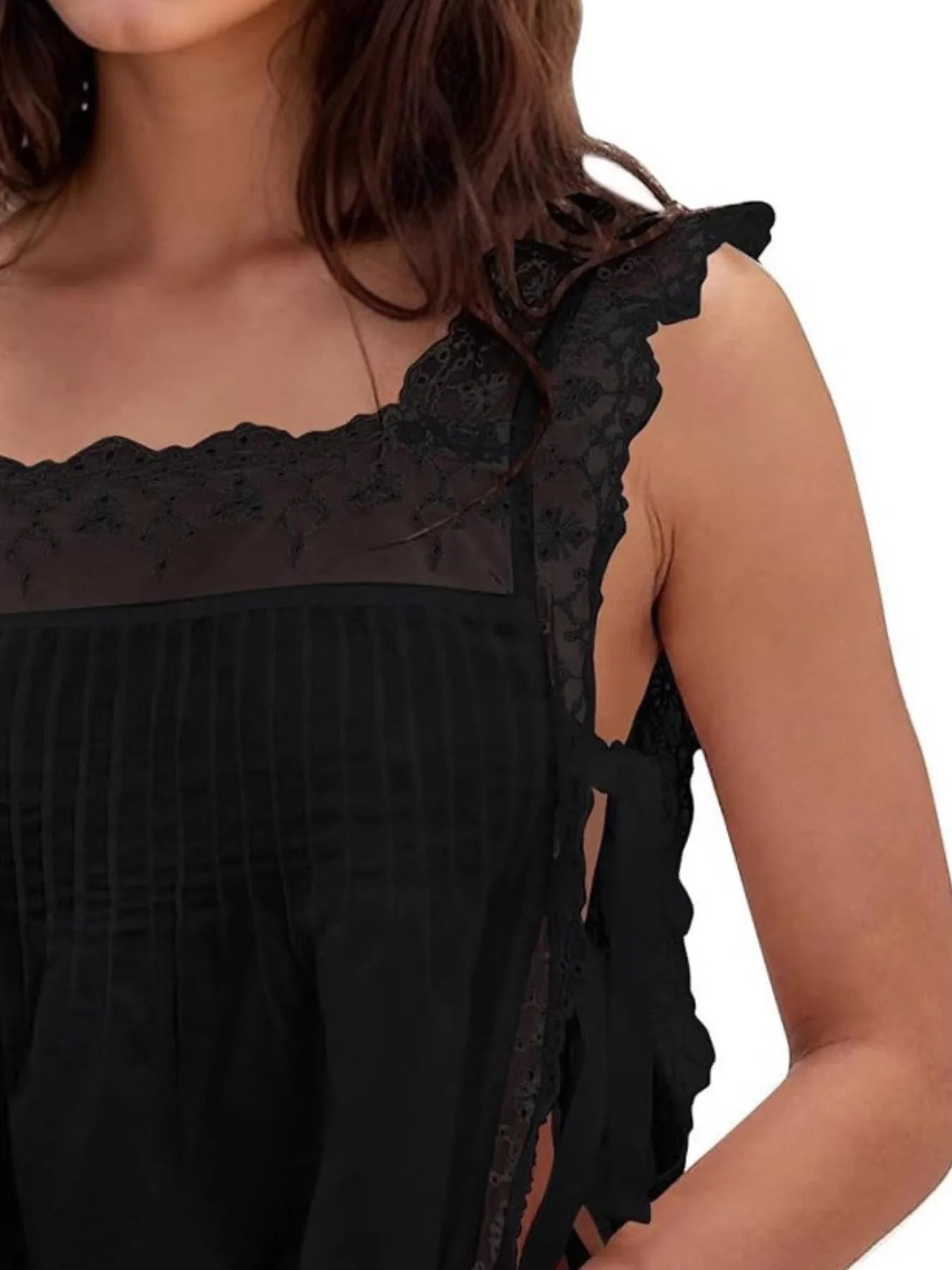 Lace-trimmed eyelet square neck top with tie detail.