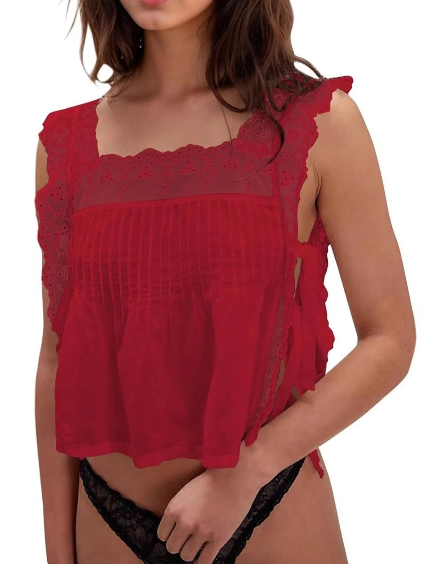 Lace-trimmed eyelet square neck top with tie detail.