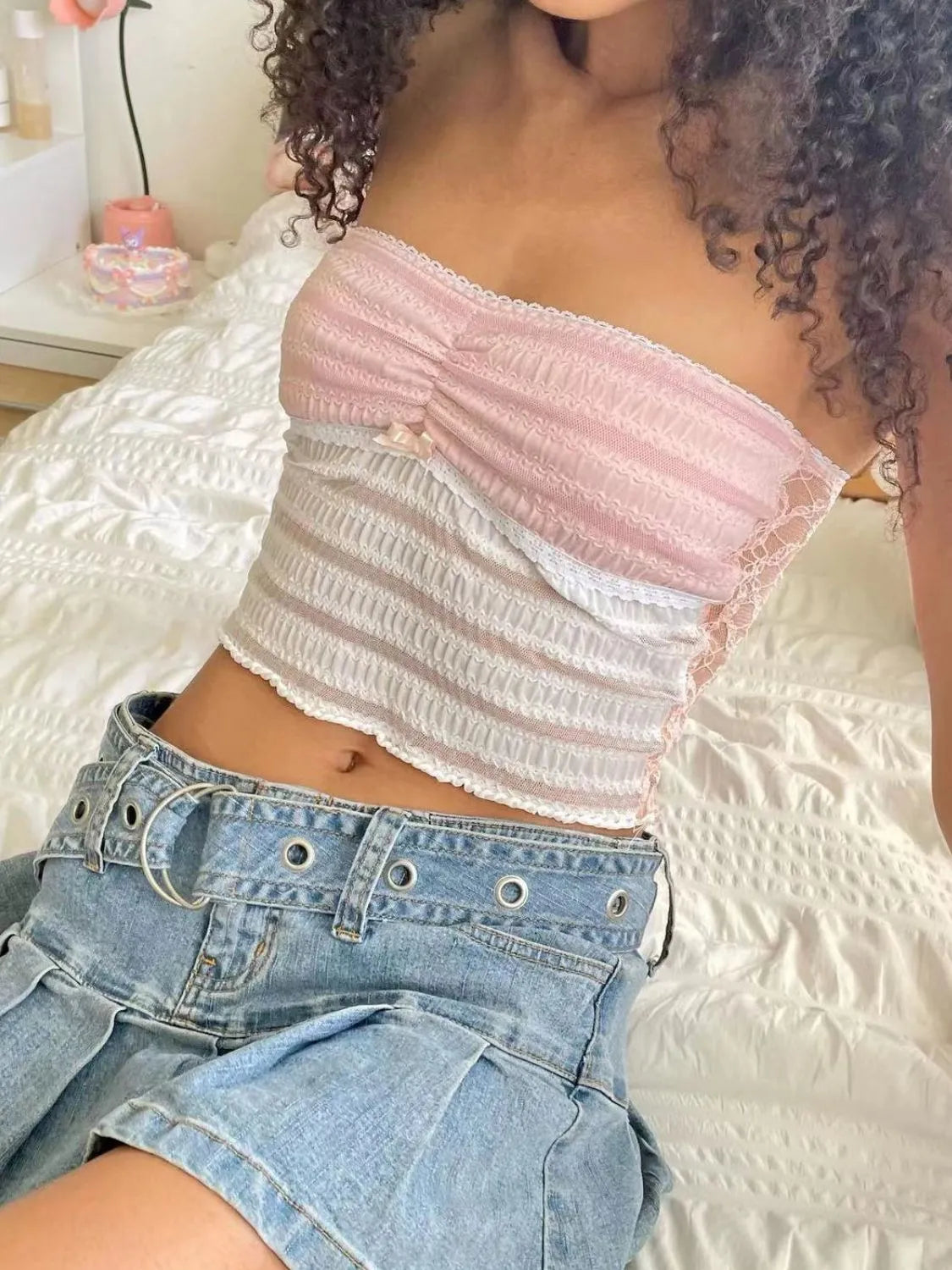 Lace tube top with slight stretch.