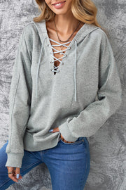 Lace up dropped shoulder hoodie.