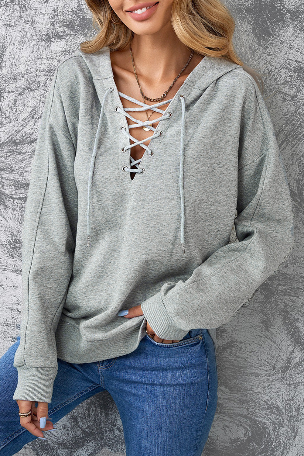Lace up dropped shoulder hoodie.