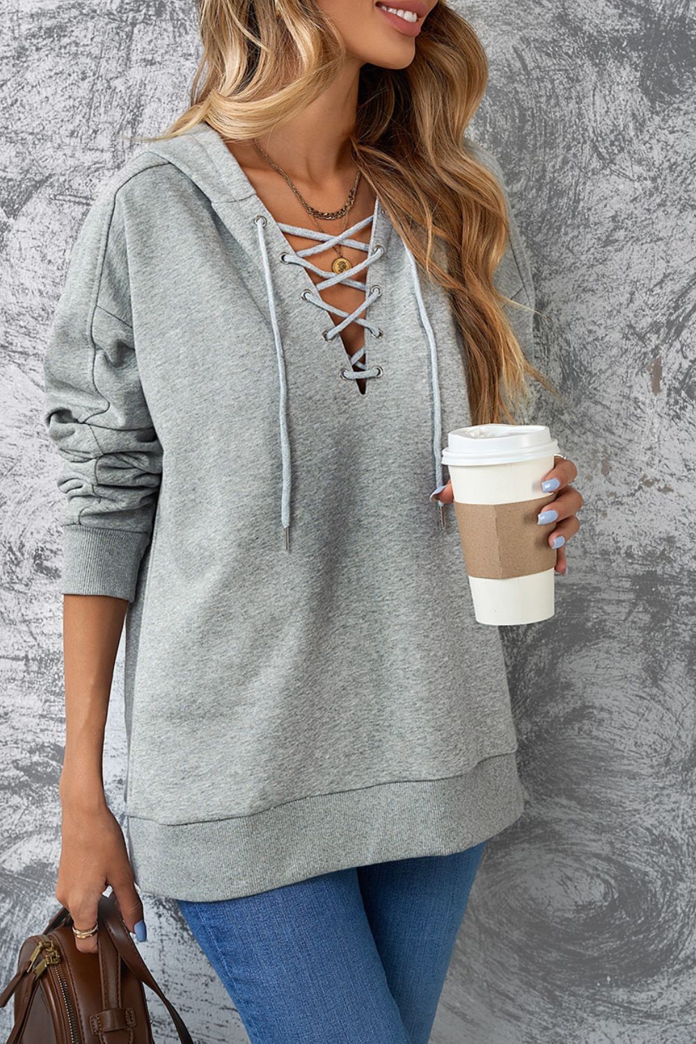 Lace up long sleeve hoodie.