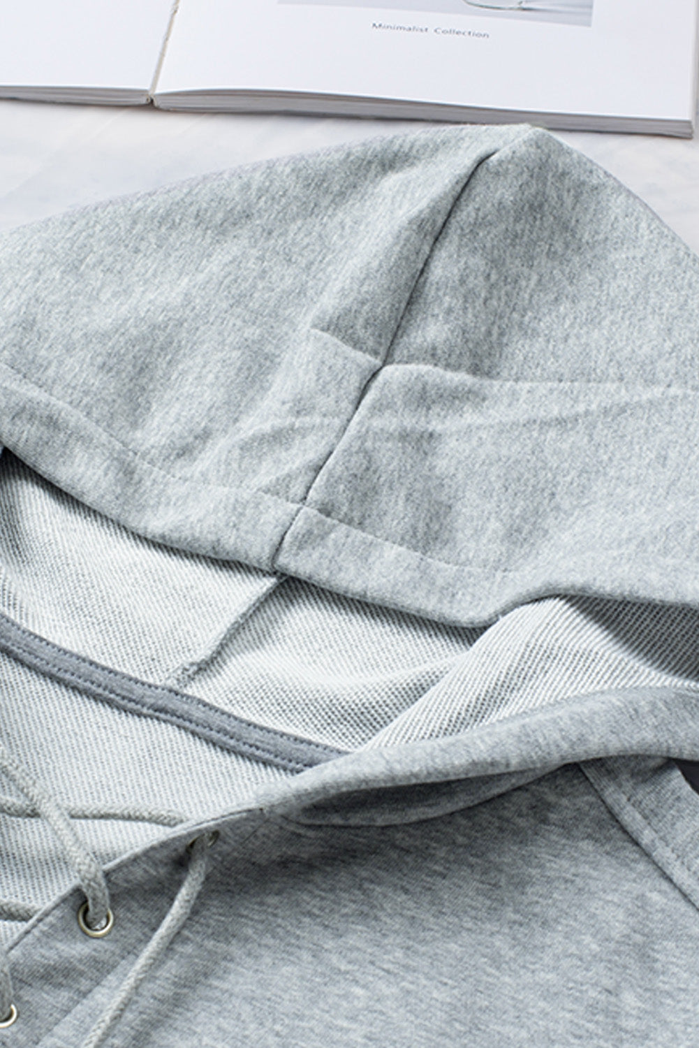 Lace up long sleeve hoodie.