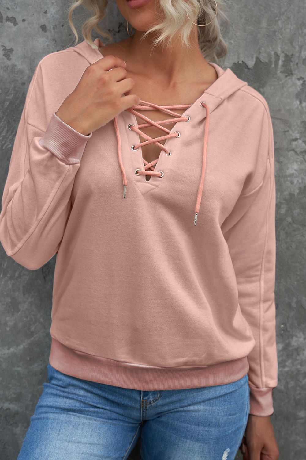 Lace up long sleeve hoodie.