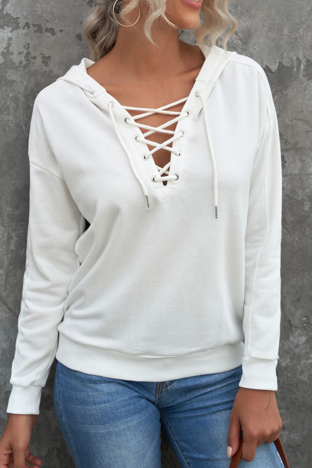 Lace up long sleeve hoodie.