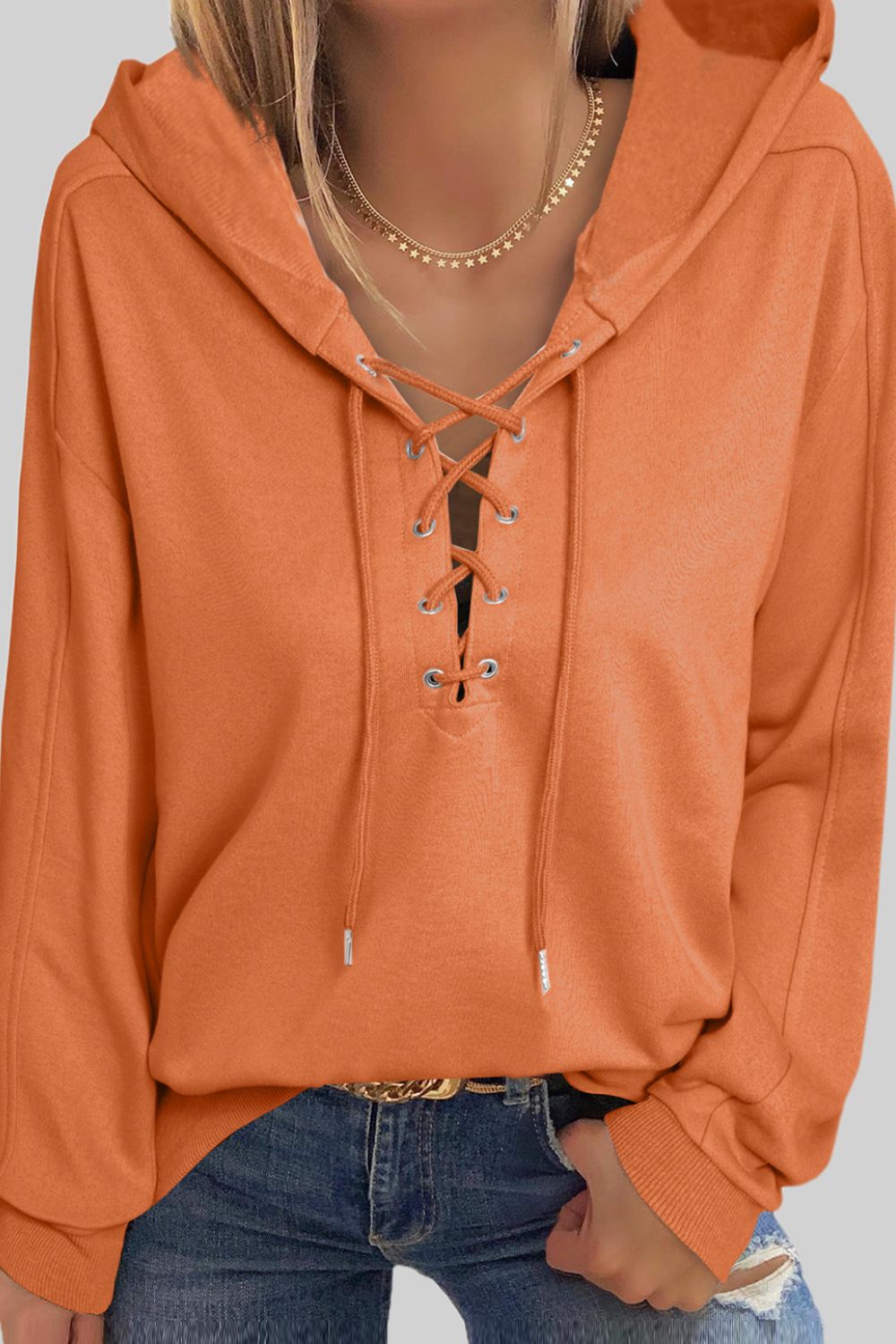 Lace up long sleeve hoodie.