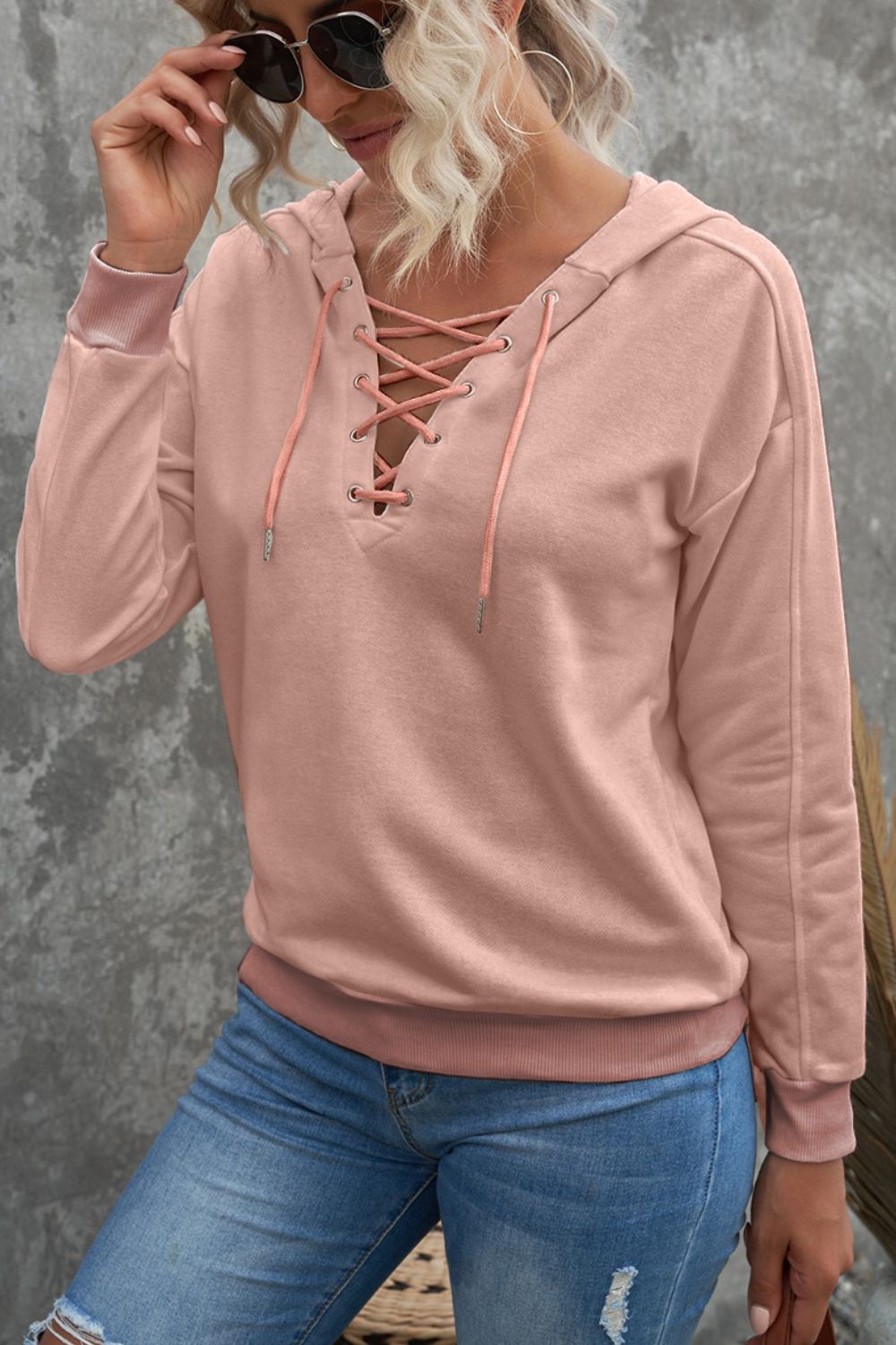 Lace up long sleeve hoodie.