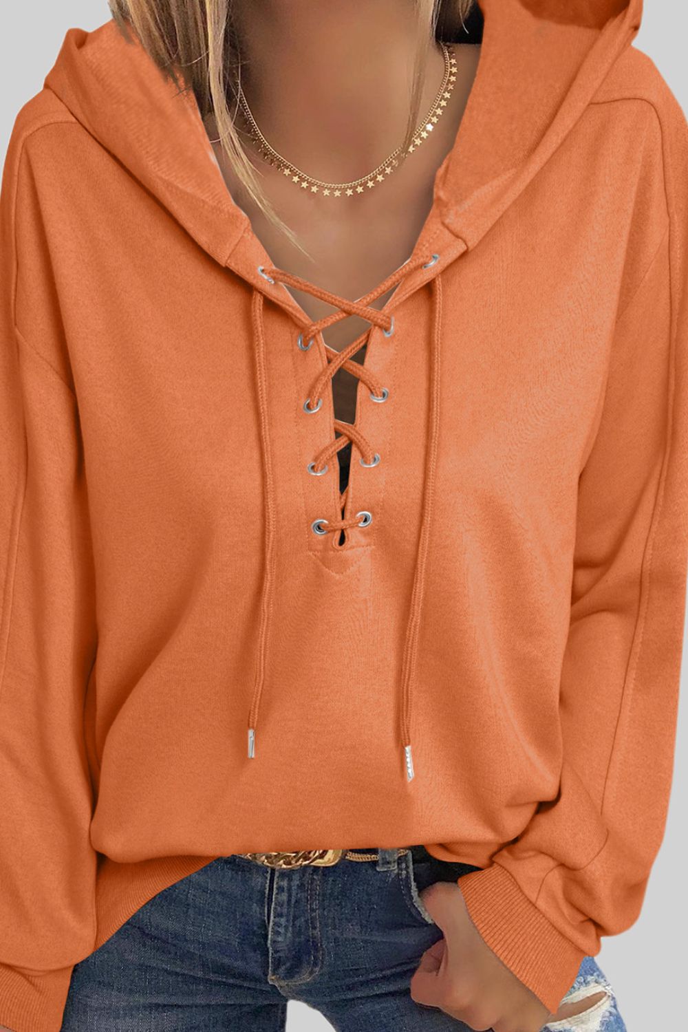 Lace up long sleeve hoodie.