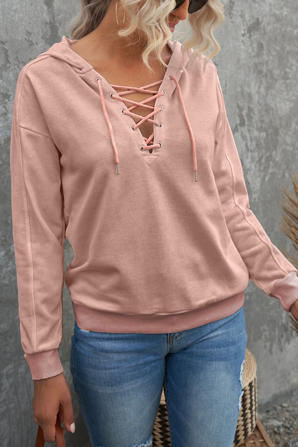 Lace up long sleeve hoodie.