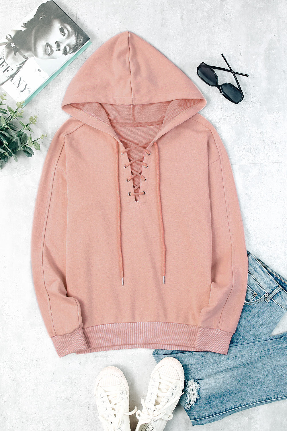 Lace up long sleeve hoodie.
