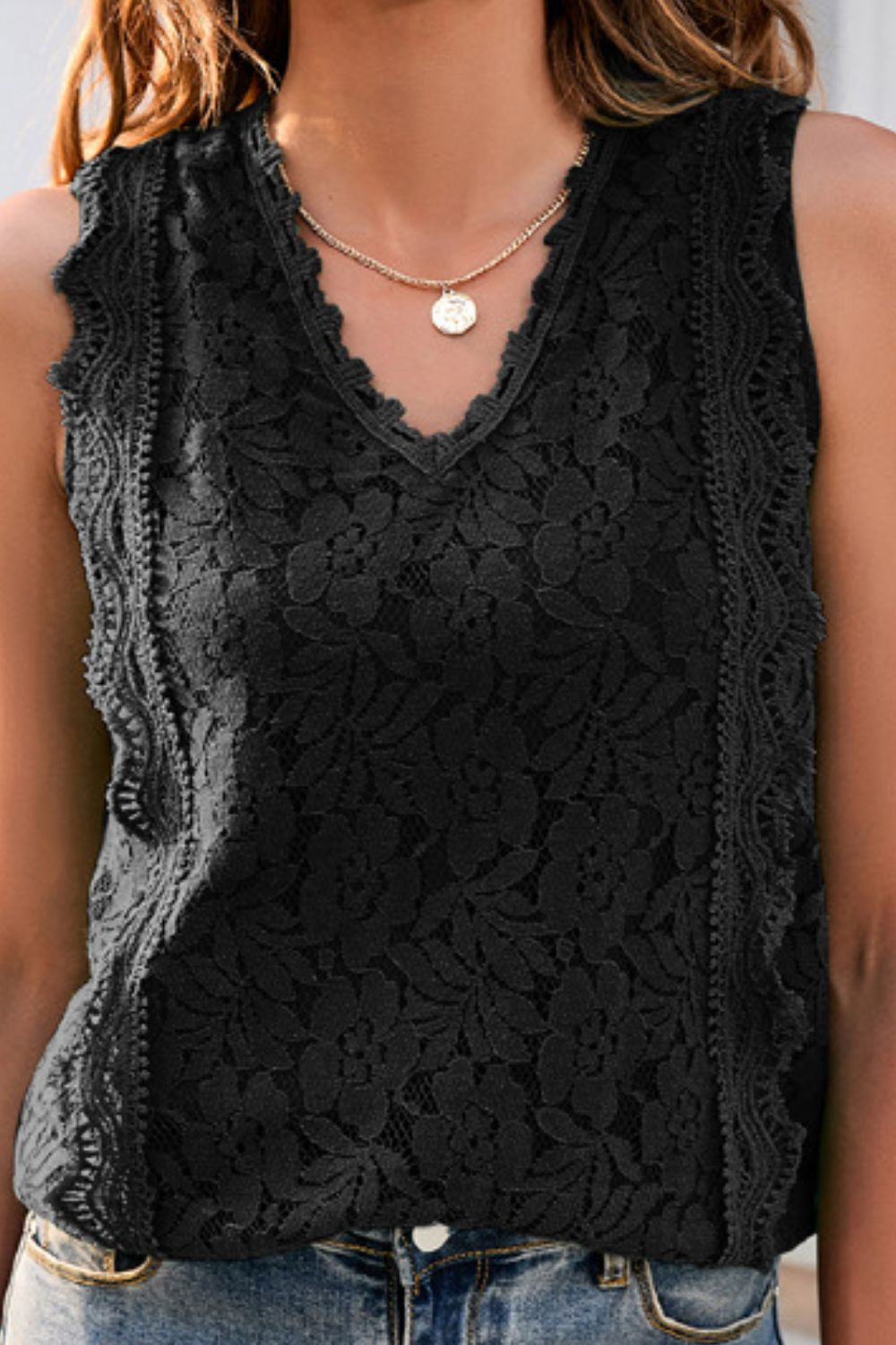 Lace V-neck tank top, solid color with lined front.