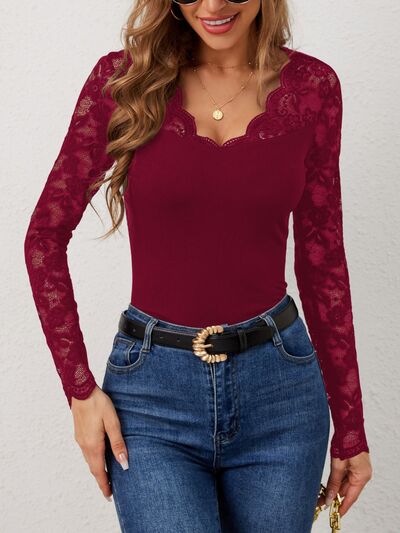 Lace Wavy Hem V-Neck Long Sleeve Top.