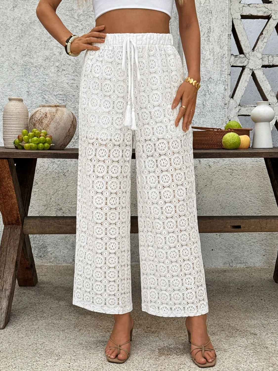 Lace wide leg pants, sheer mesh style.