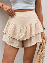 Layered printed elastic waist shorts.