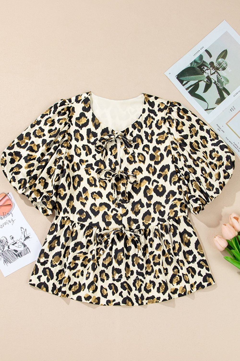 Leopard Bow Tie Front Puff Sleeve Peplum Blouse.