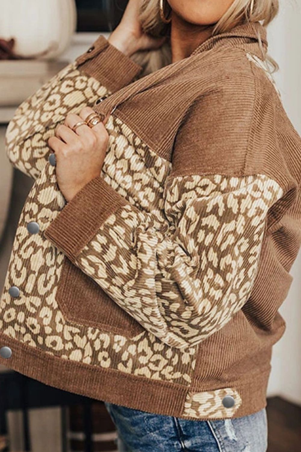 Leopard print button-up drop shoulder jacket with pockets.