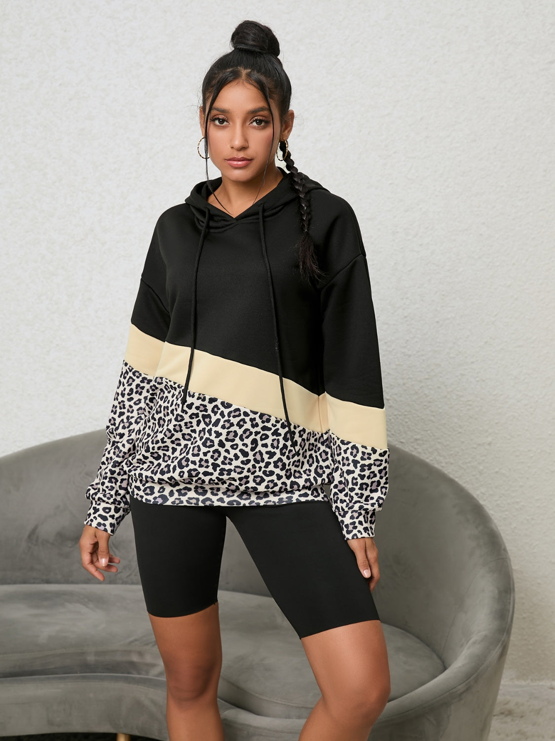 Leopard print and color block drawstring hoodie.