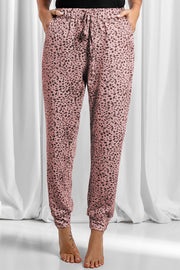 Leopard drawstring pocketed pants, opaque.