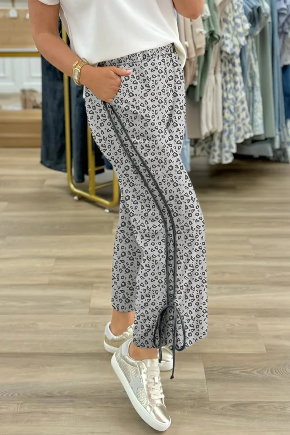 Leopard high waist side bow pants with pockets.