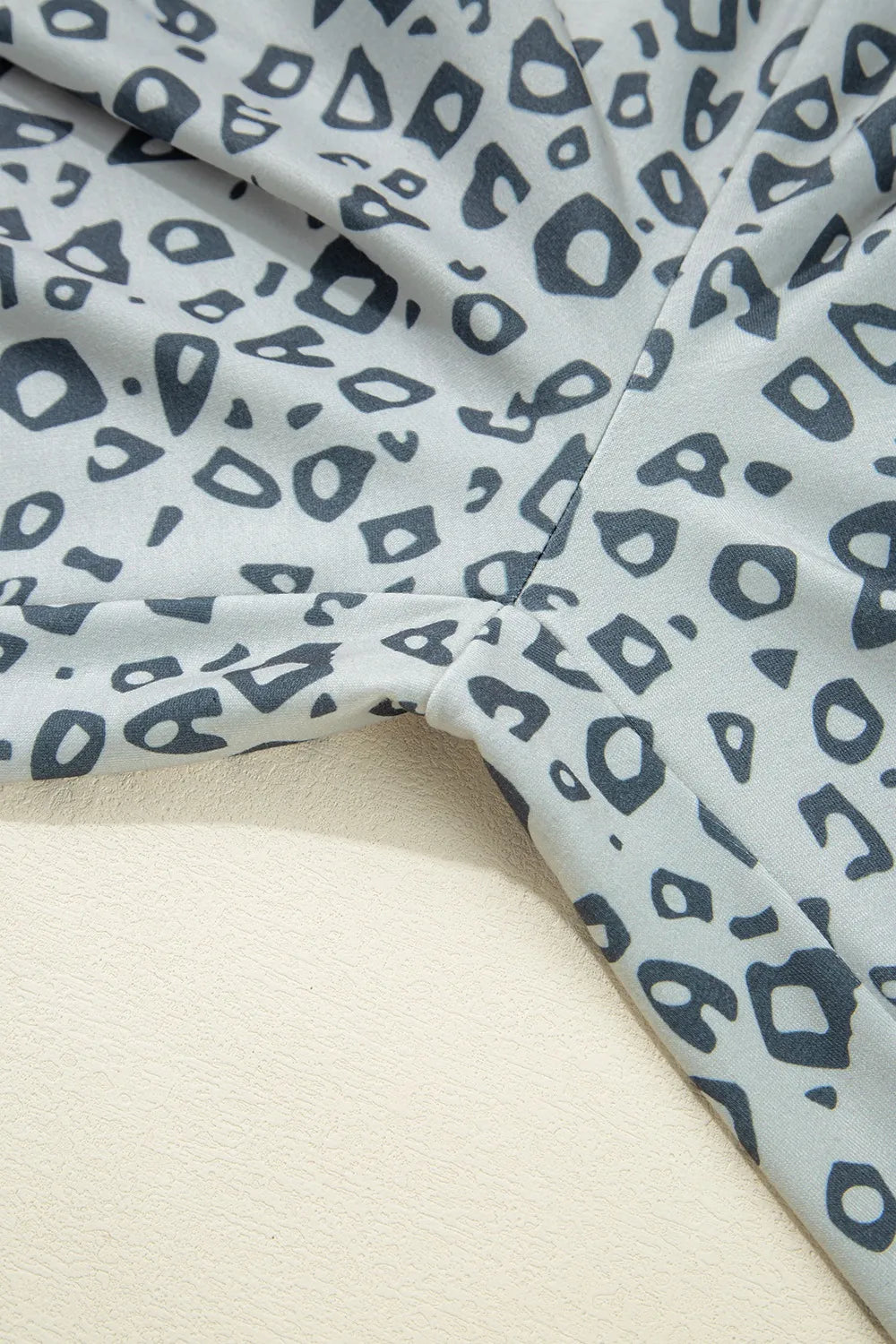 Leopard high waist side bow pants with pockets.