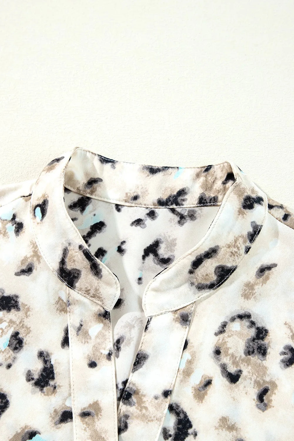 Leopard Print Buttoned Front 3/4 Sleeve Tiered Ruffled Hem Dress.