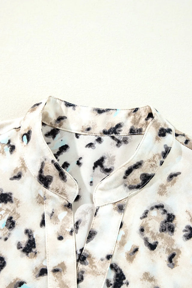 Leopard Print Buttoned Front 3/4 Sleeve Tiered Ruffled Hem Dress.