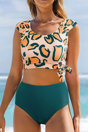 Leopard print U-neck knotted high-waist bikini set with removable padding.
