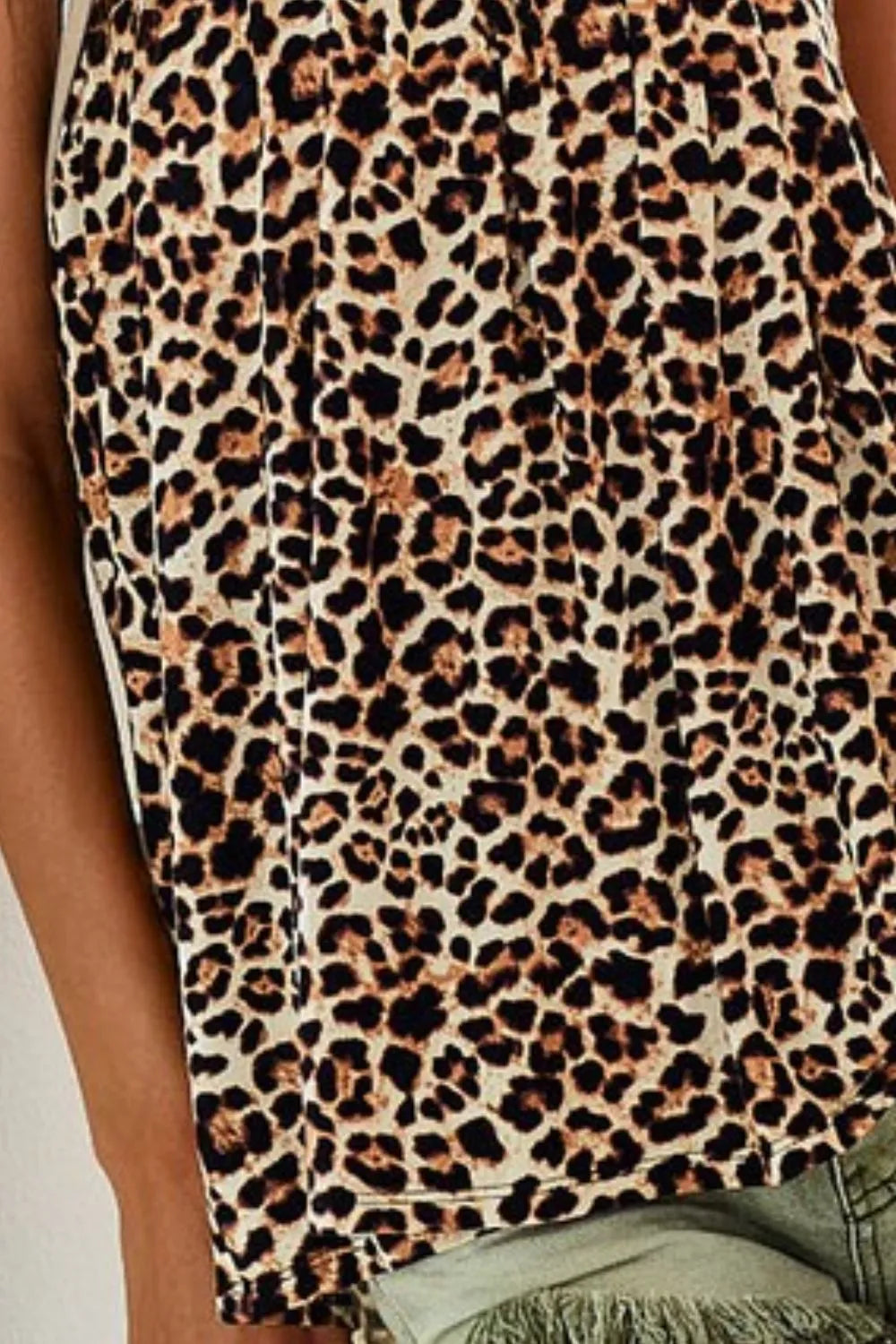 Leopard printed jersey knit cami top with gathering detail, slightly stretchy.
