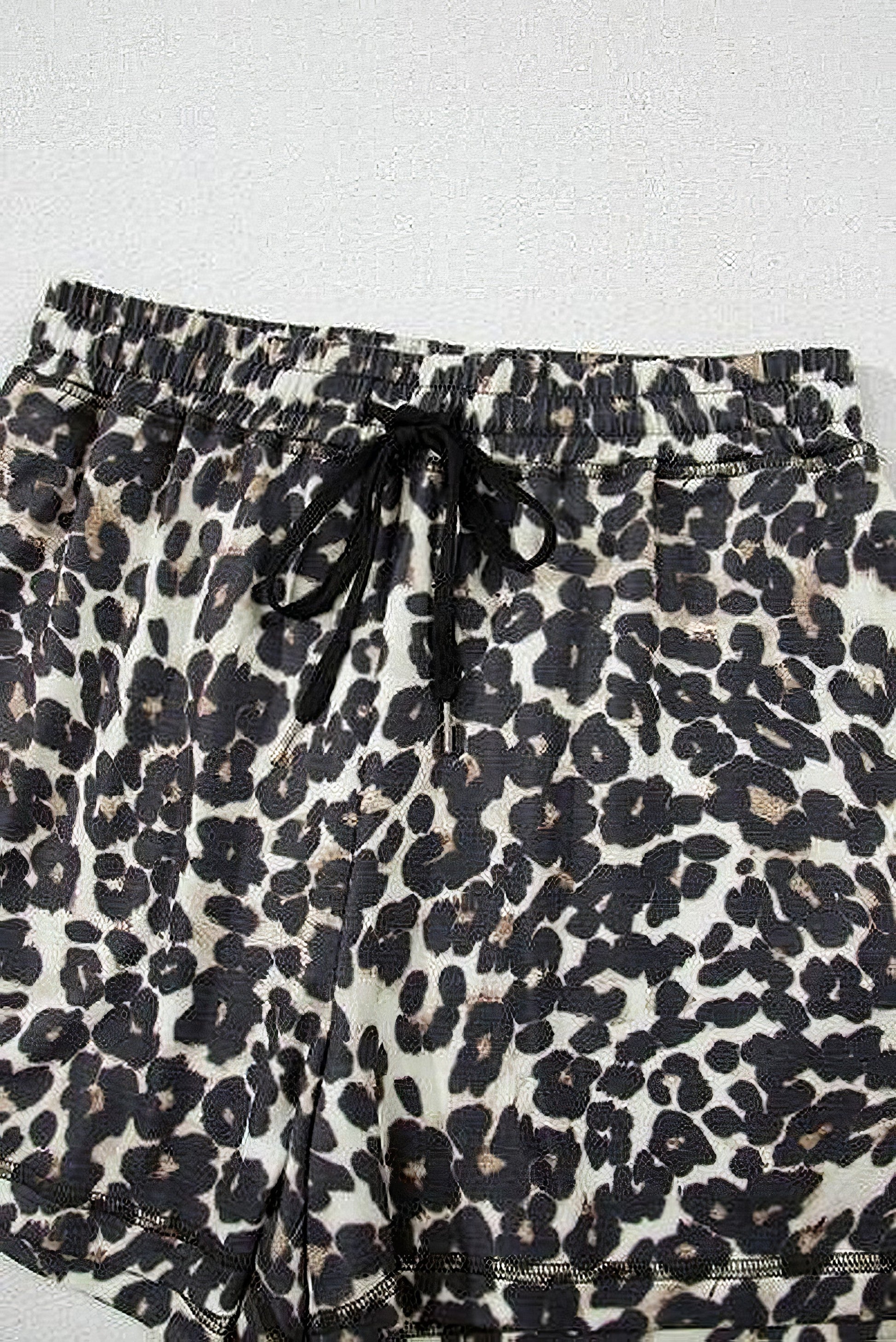 Women's leopard print round neck top and shorts set with drawstring