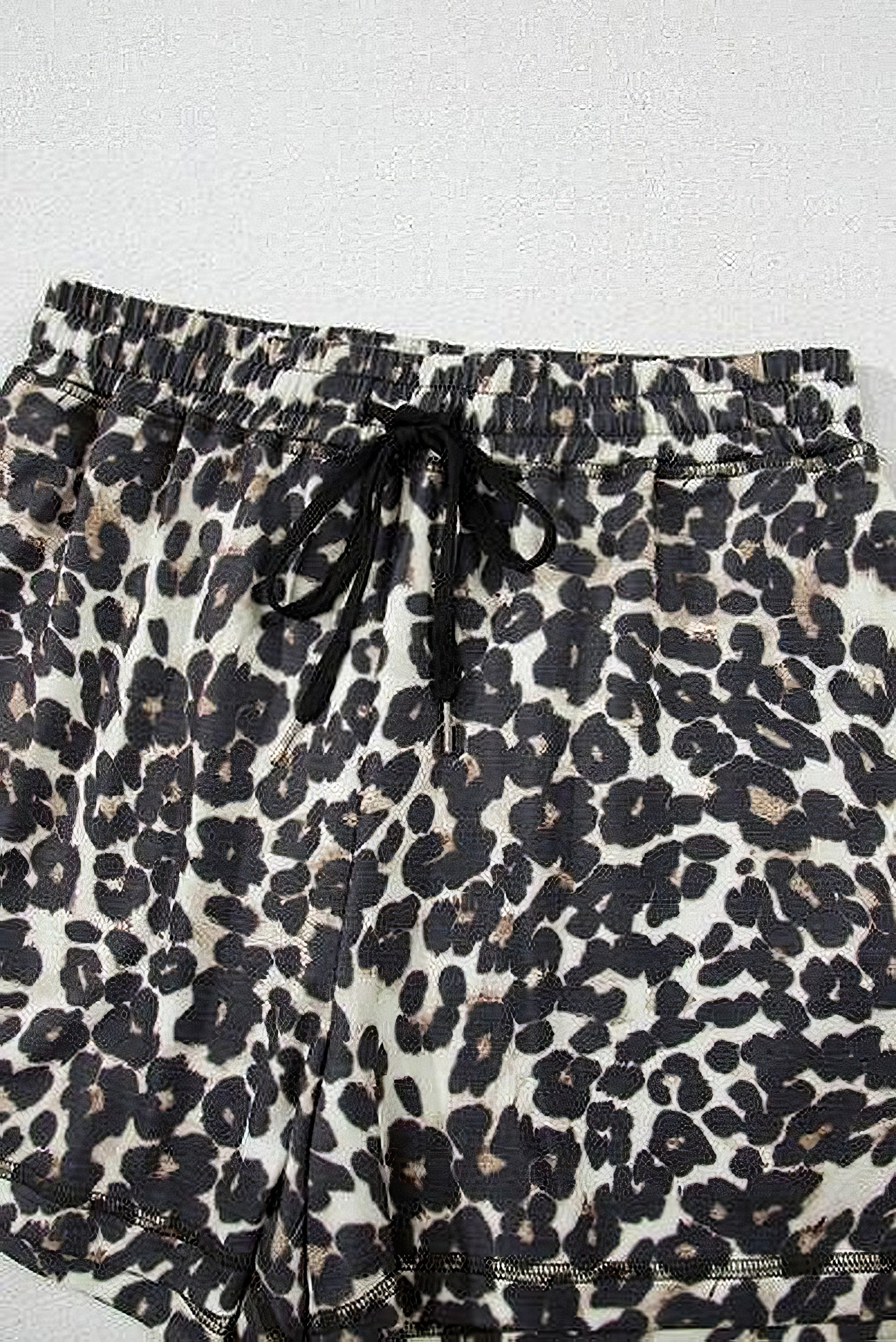 Women's leopard print round neck top and shorts set with drawstring