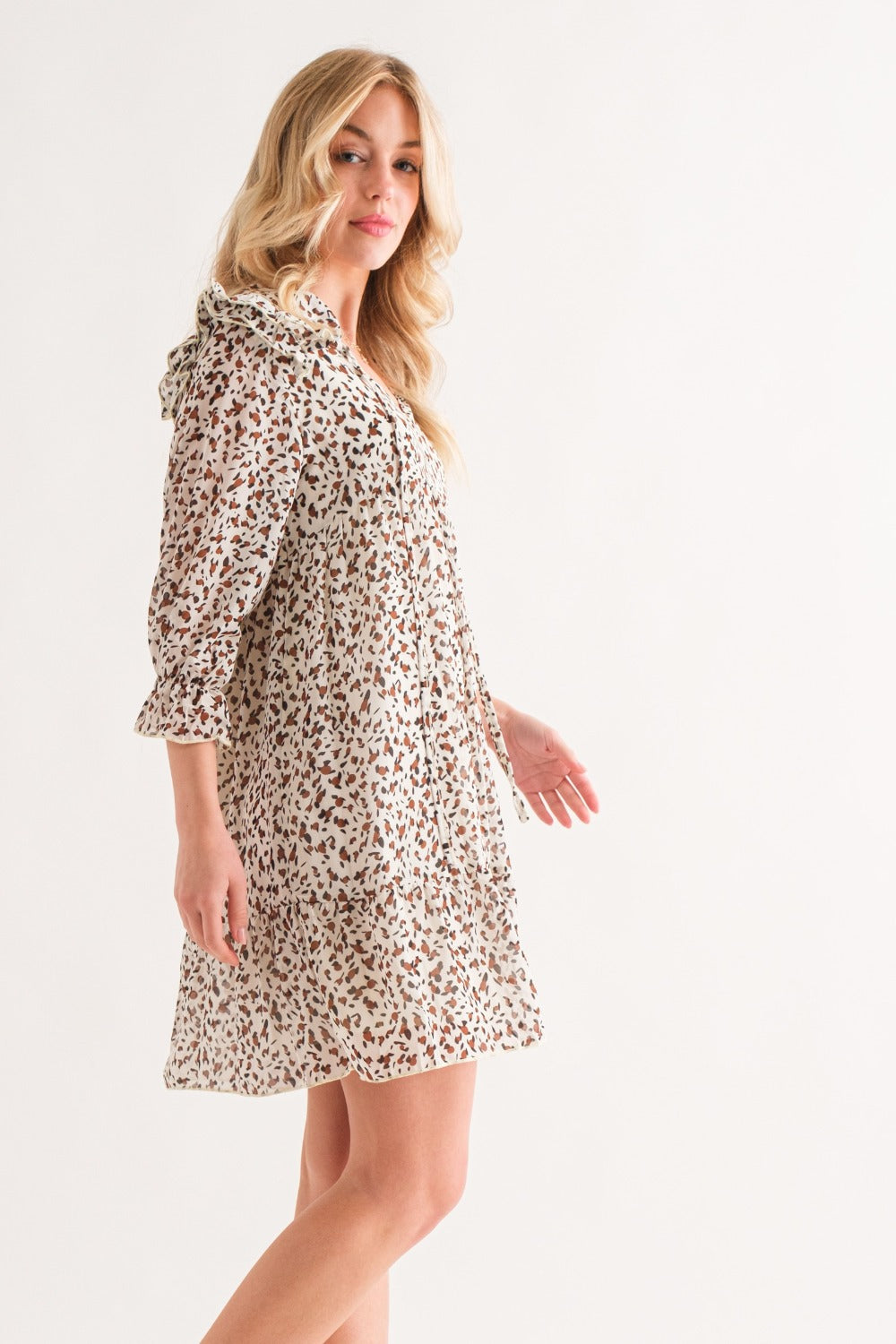 And The Why Leopard Ruffle Hem Woven Mini Dress.
