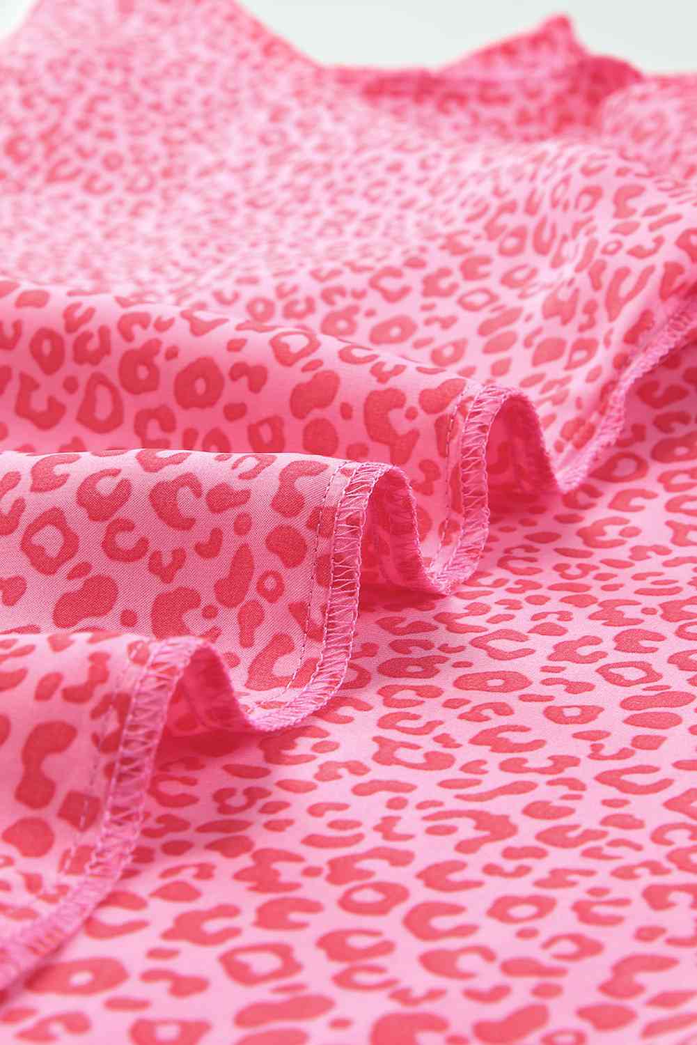 Leopard Smocked Flounce Sleeve Blouse.