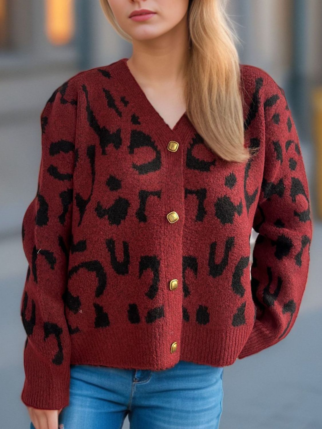 Leopard print V-neck button up cardigan.