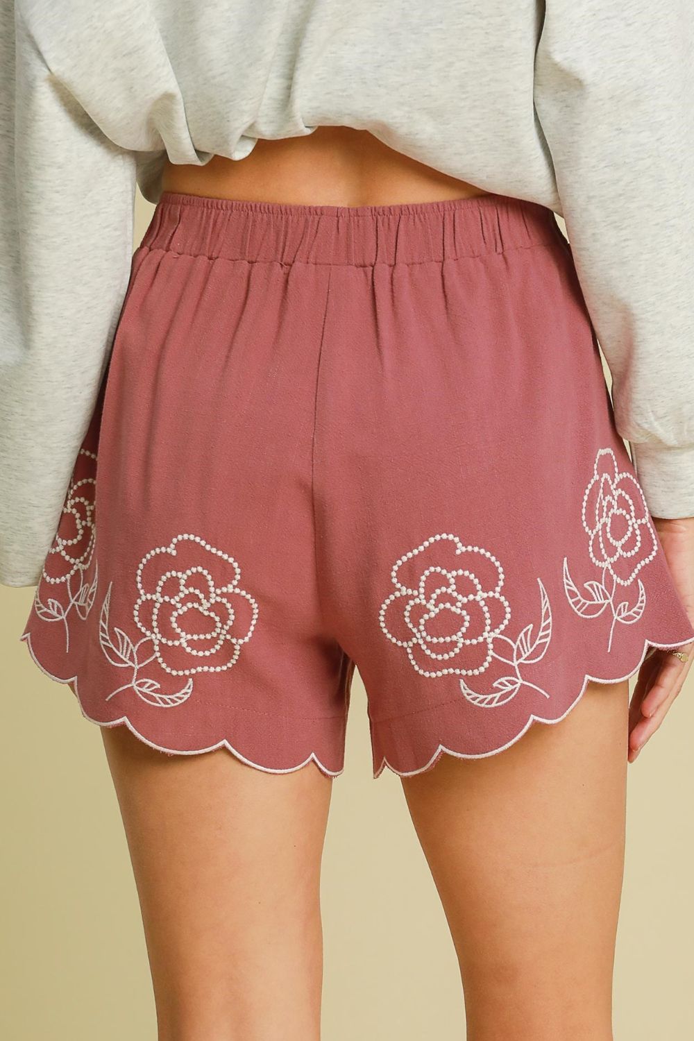 Low rise patched pocket shorts.