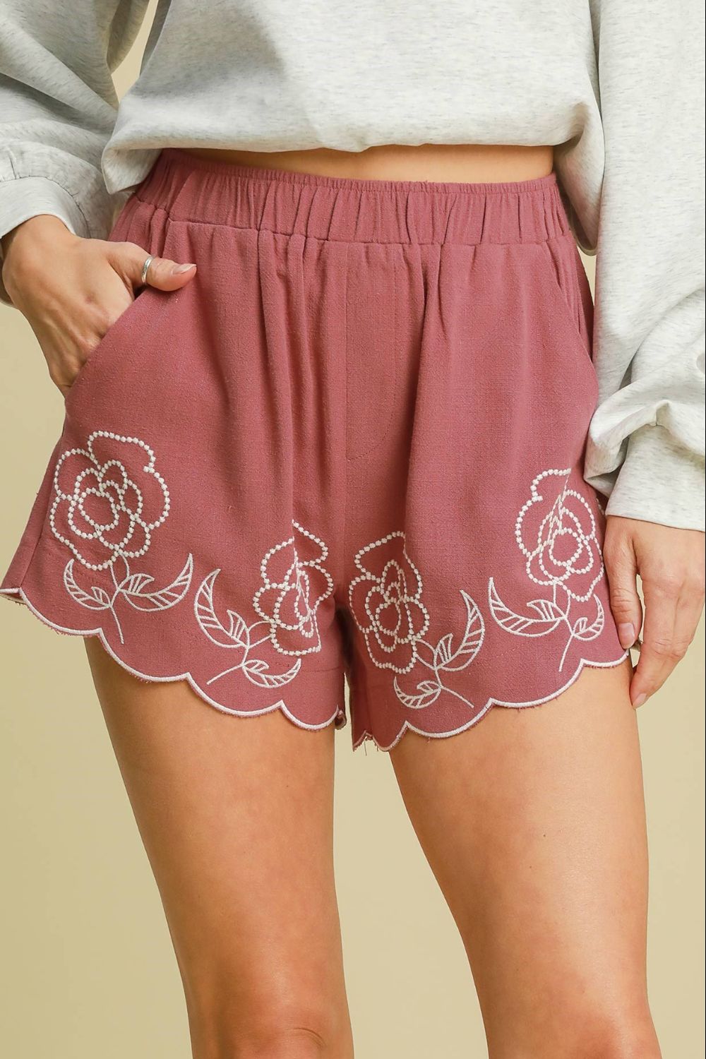 Low rise patched pocket shorts.