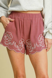 Low rise patched pocket shorts.
