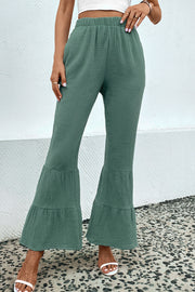 Long flare pants with pocket, casual style.