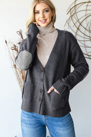 Full size long sleeve V-neck button down cardigan with pockets and ribbed details.