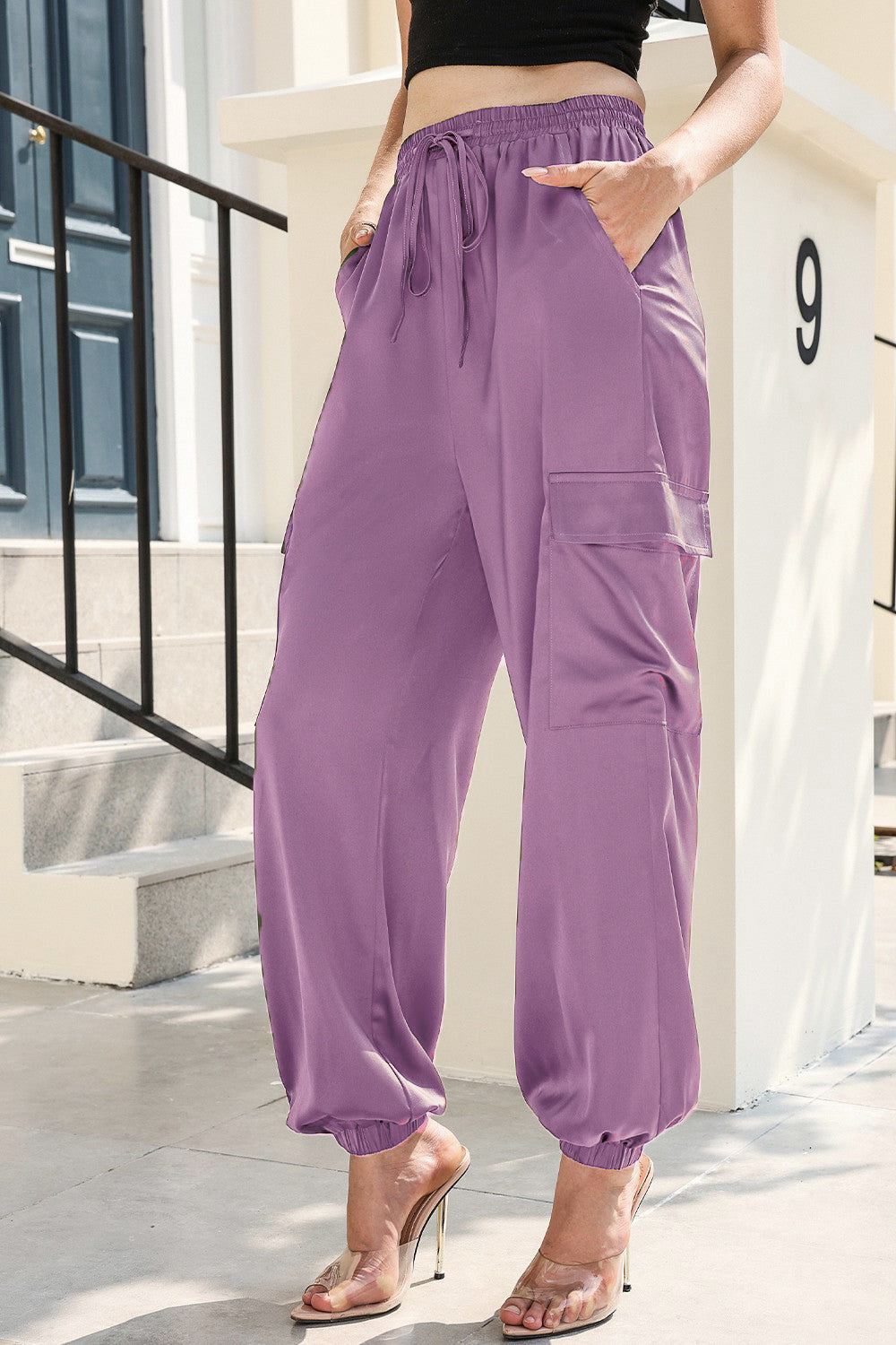 Long tie waist pocketed pants, casual style.