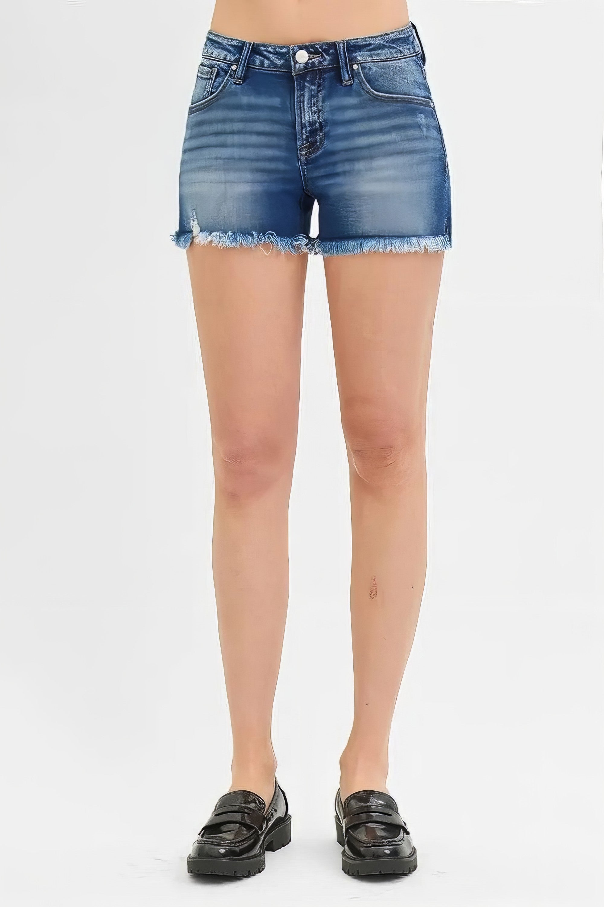Plus size low rise frayed denim shorts with distressed details.
