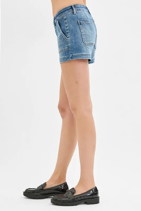 High-waist denim shorts with buttons and pockets.