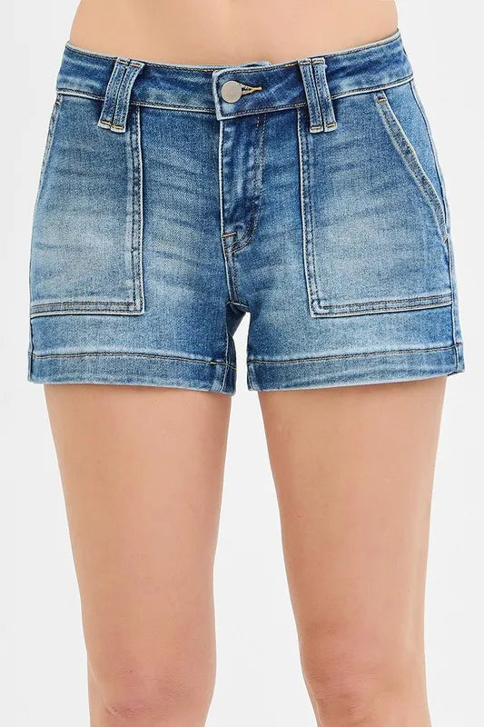 High-waist denim shorts with buttons and pockets.