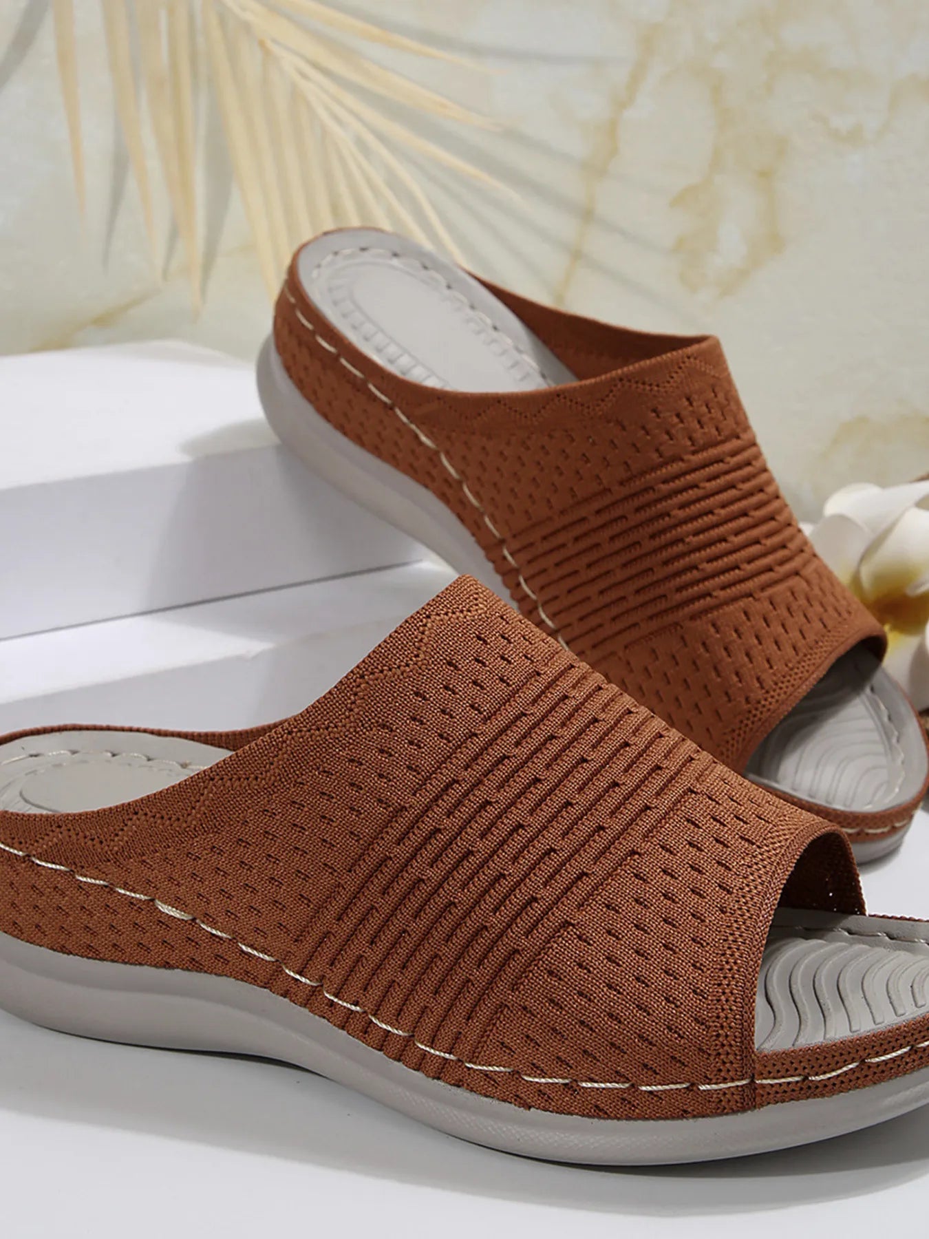 Breathable mesh open toe flat sandals.