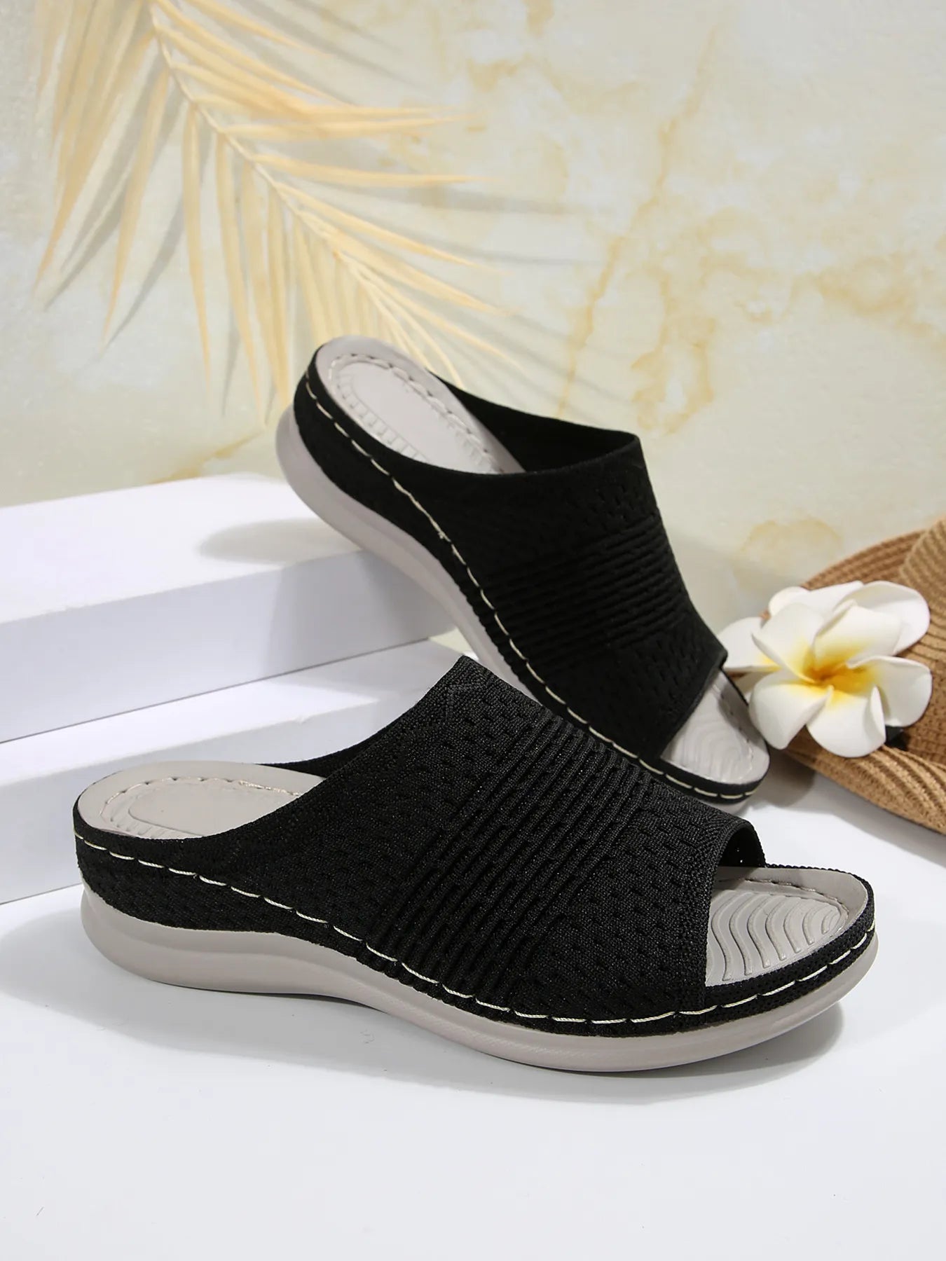 Breathable mesh open toe flat sandals.