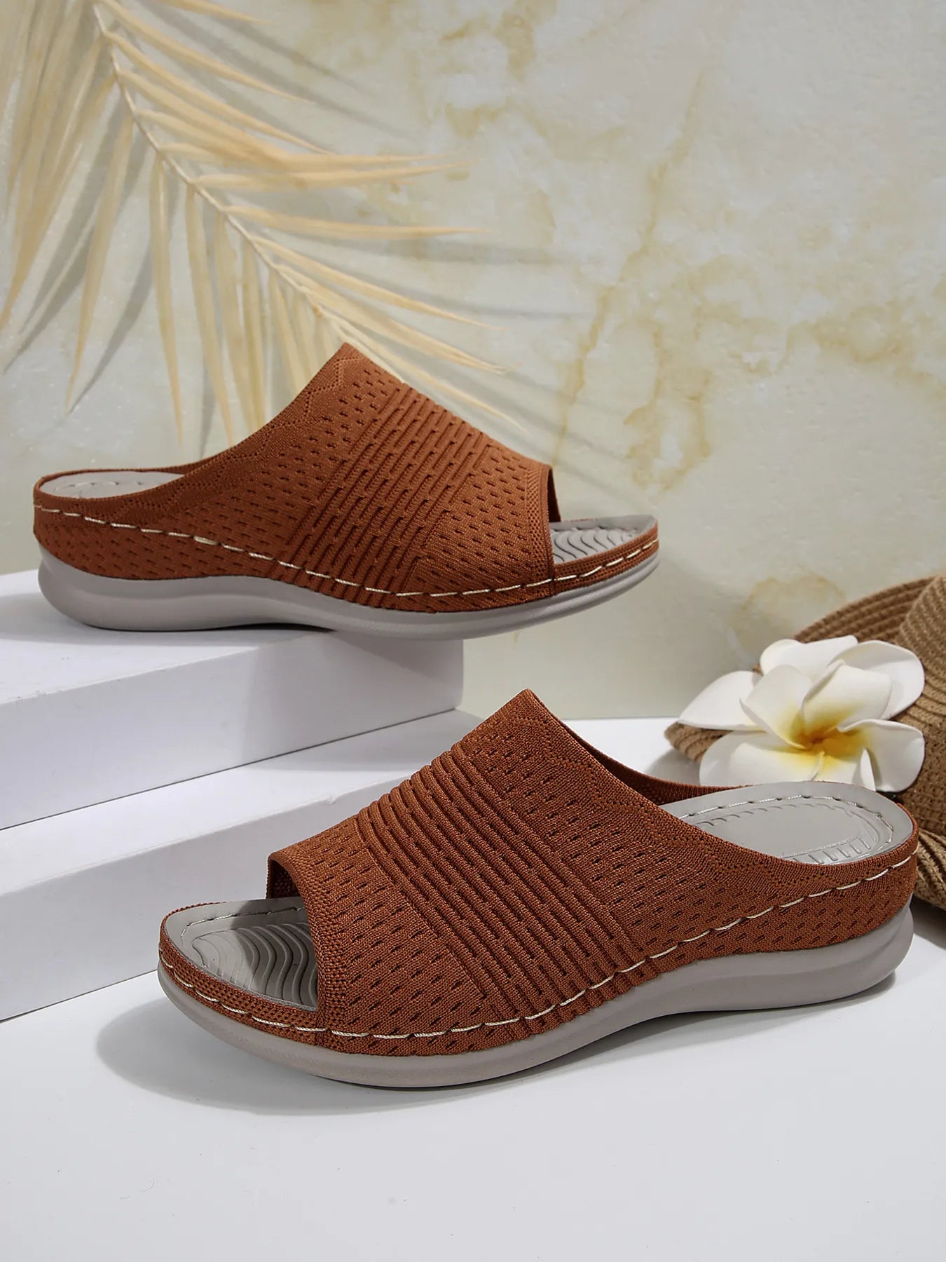 Breathable mesh open toe flat sandals.